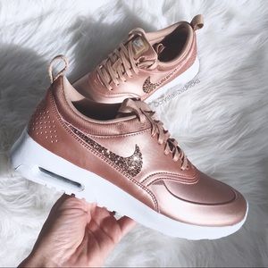 nike thea rose gold womens